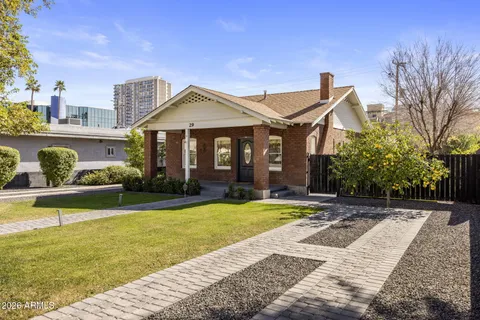 a front view of a house with swimming pool