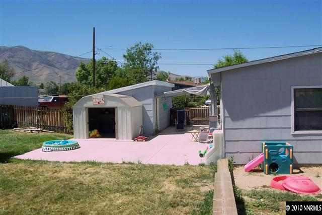 11150 Rocky Mountain Street Reno, NV 89506 - Photo 8 of 9 a view of a backyard of the house