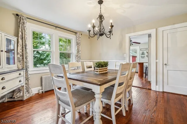 a view of a living room and a wooden floor