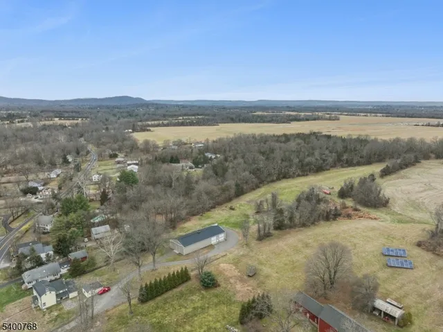 an outdoor space with furniture and garden