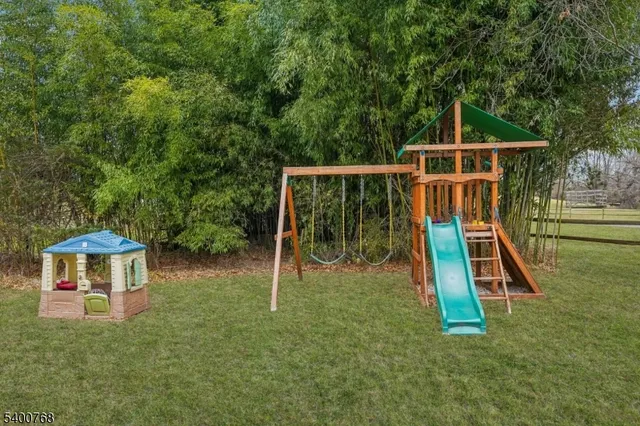 a view of a backyard of the house