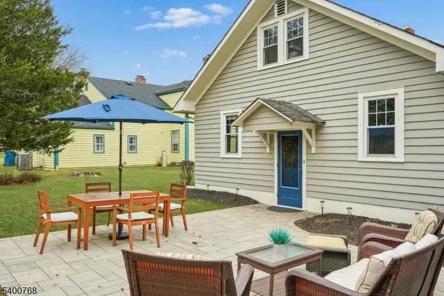a aerial view of a house with a yard