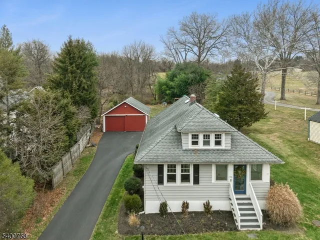 a aerial view of a house with a big yard