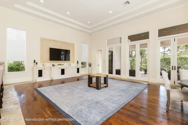 a kitchen with sink and view living room