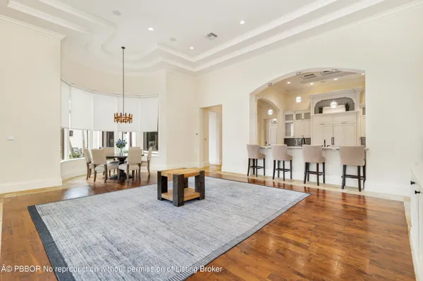a dining room with furniture window wooden floor