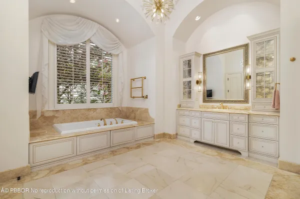 a kitchen with a stove and cabinets