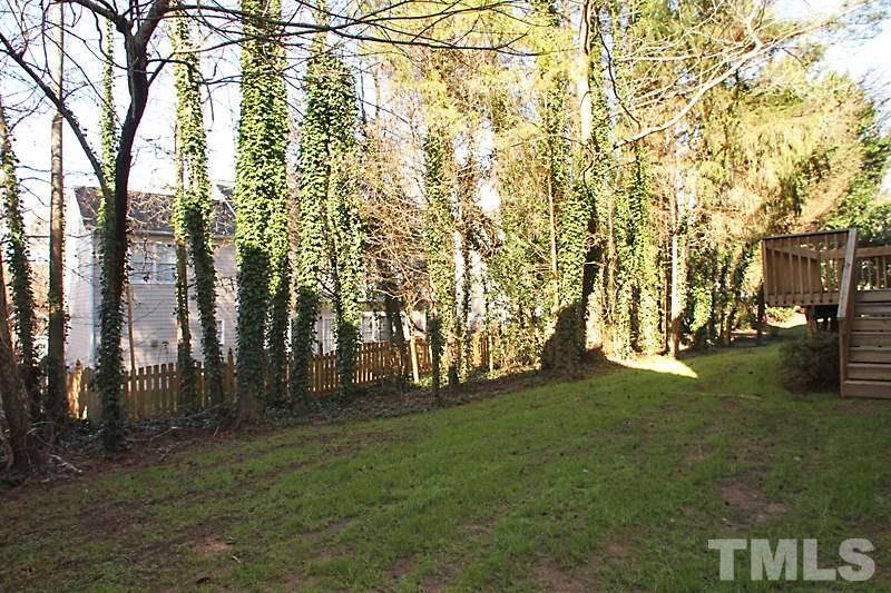 9021 Breeland Way Raleigh, NC 27613 - Photo 18 of 20 a view of yard with trees