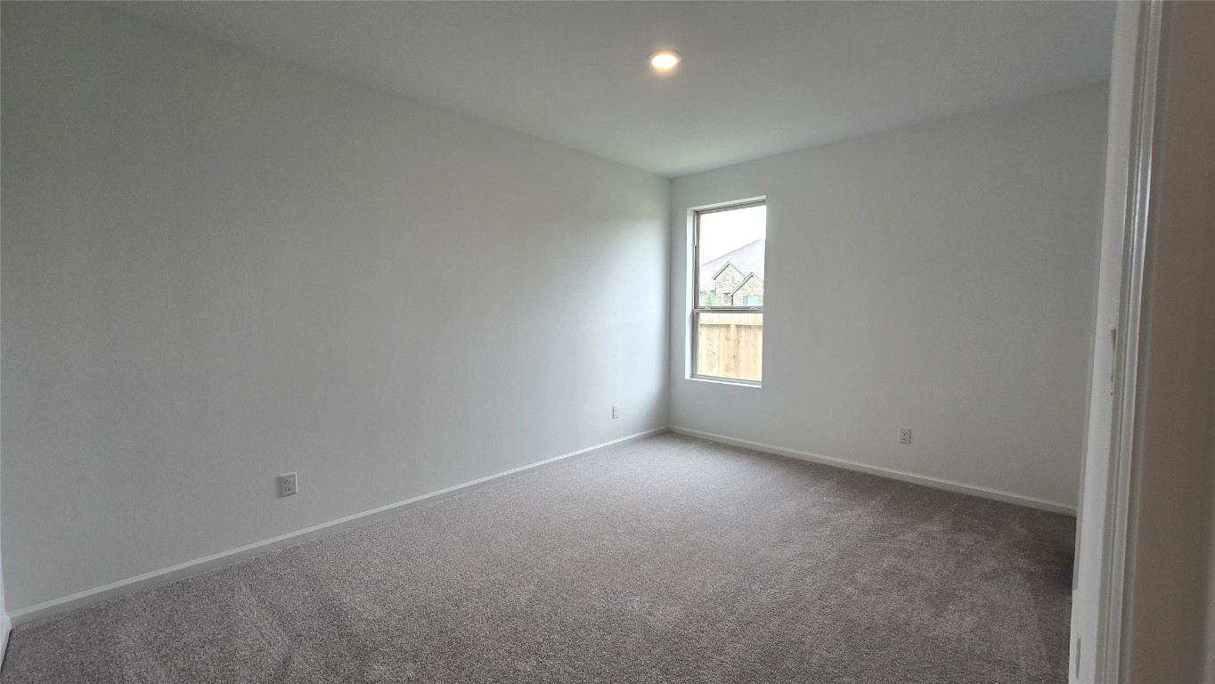 8223 Holly Blue Drive Rosharon, TX 77583 - Photo 38 of 48 a view of empty room with window