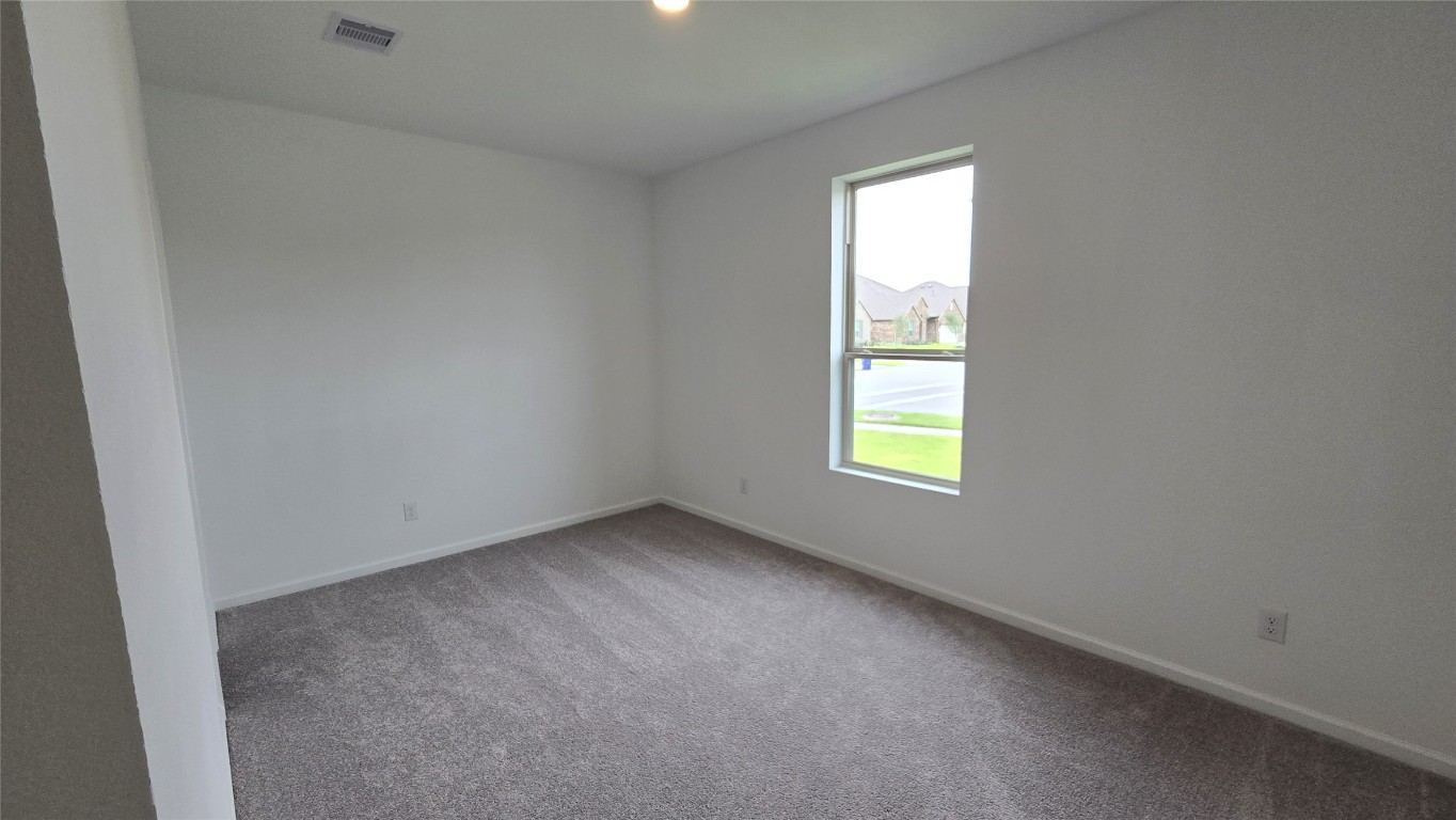 8223 Holly Blue Drive Rosharon, TX 77583 - Photo 39 of 48 an empty room with a window