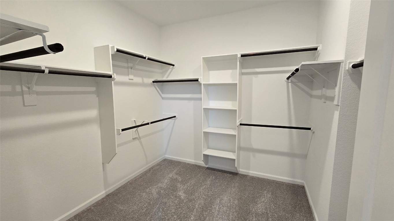 8223 Holly Blue Drive Rosharon, TX 77583 - Photo 41 of 48 a white refrigerator freezer and white cabinets