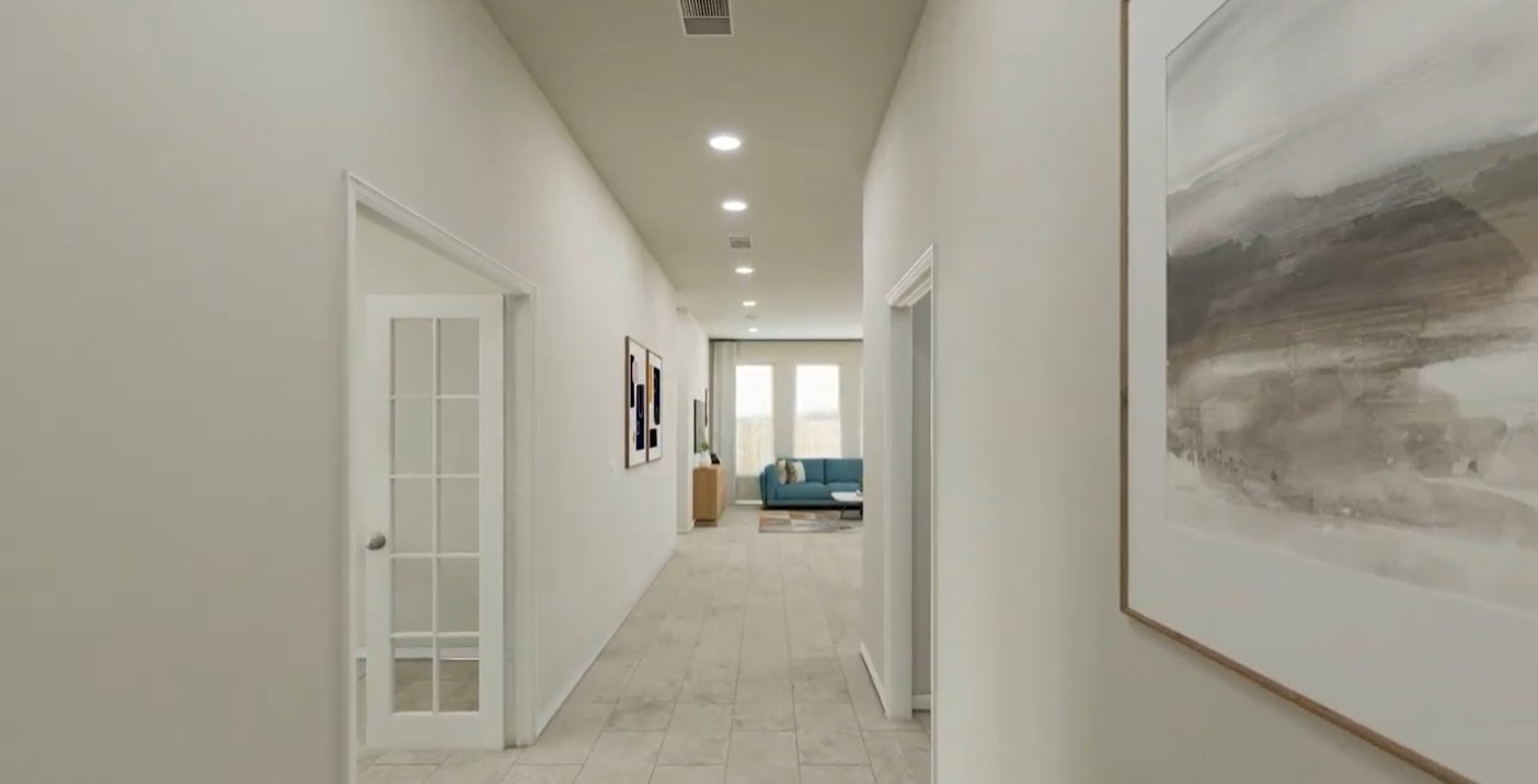 8223 Holly Blue Drive Rosharon, TX 77583 - Photo 15 of 48 a view of a hallway with wooden floor and a bathroom