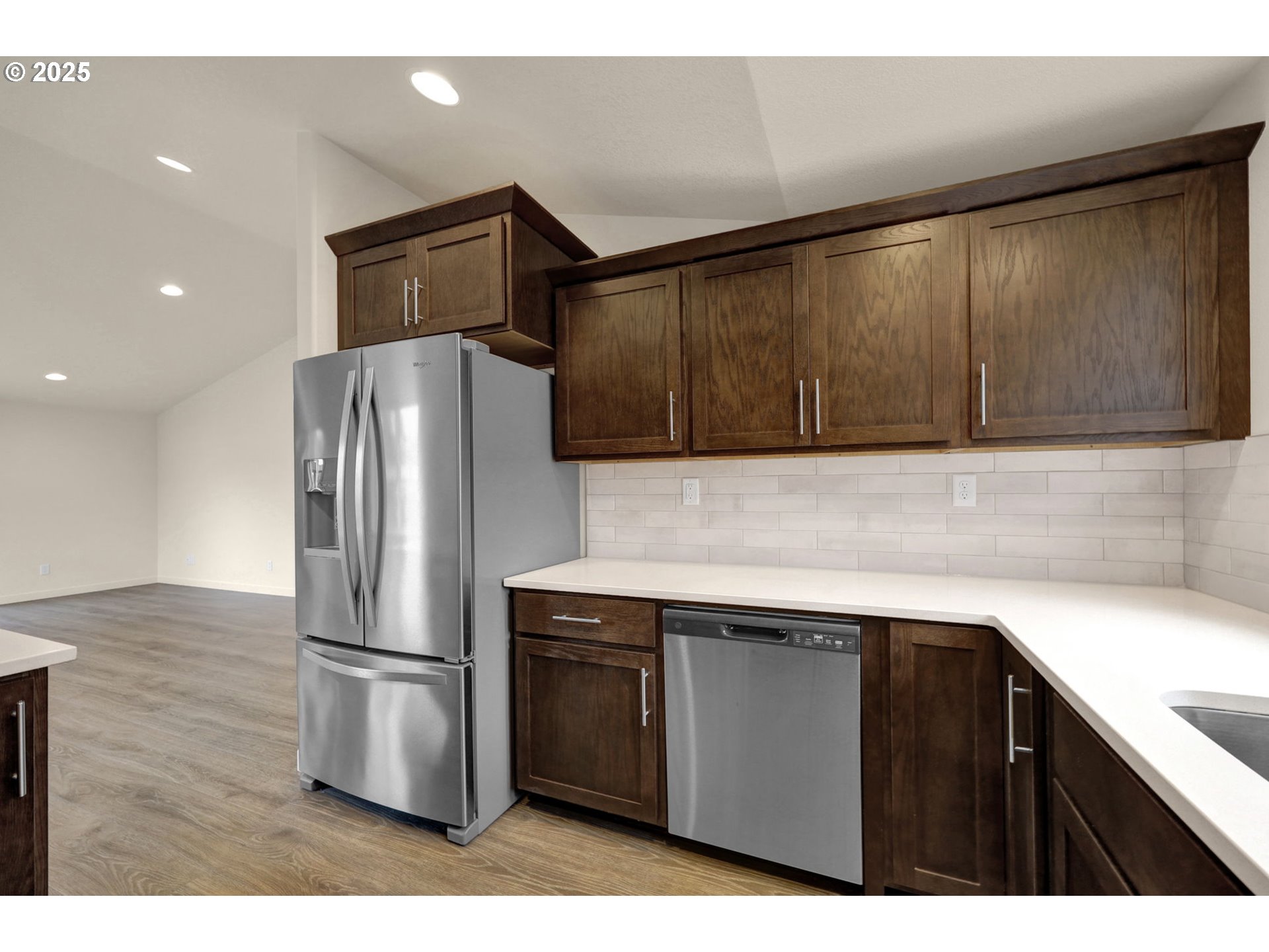 1632 Dotie Drive Springfield, OR 97477 - Photo 11 of 29 a kitchen with a refrigerator sink and cabinets