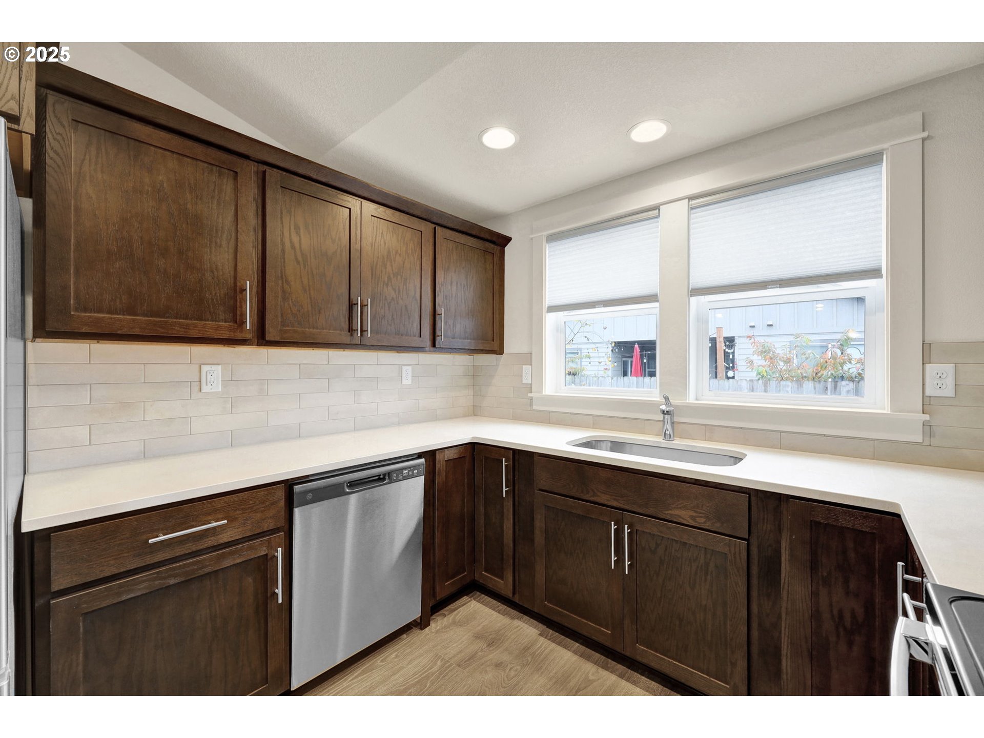 1632 Dotie Drive Springfield, OR 97477 - Photo 12 of 29 a kitchen with a sink and cabinets