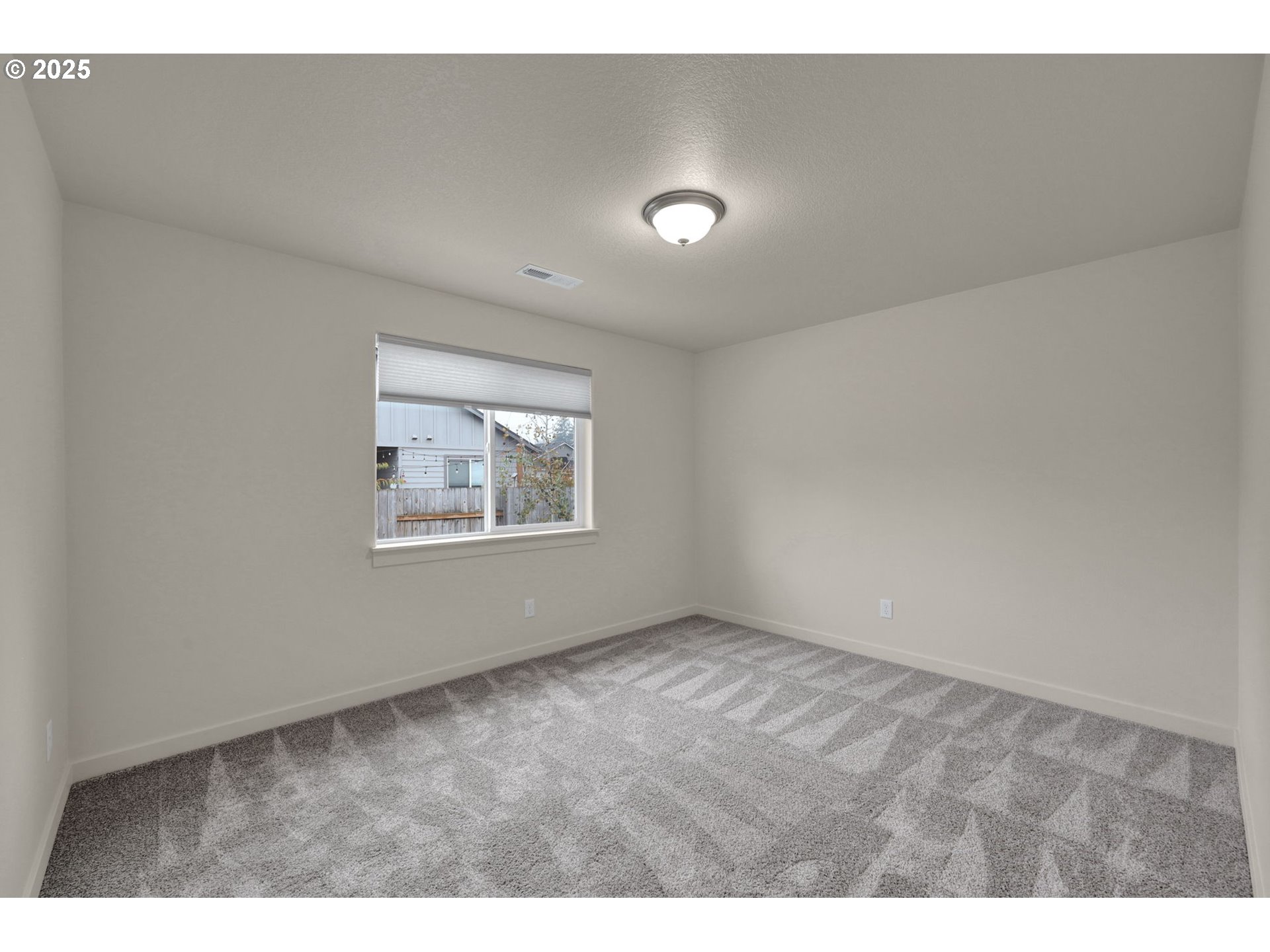 1632 Dotie Drive Springfield, OR 97477 - Photo 18 of 29 a view of an empty room with a window