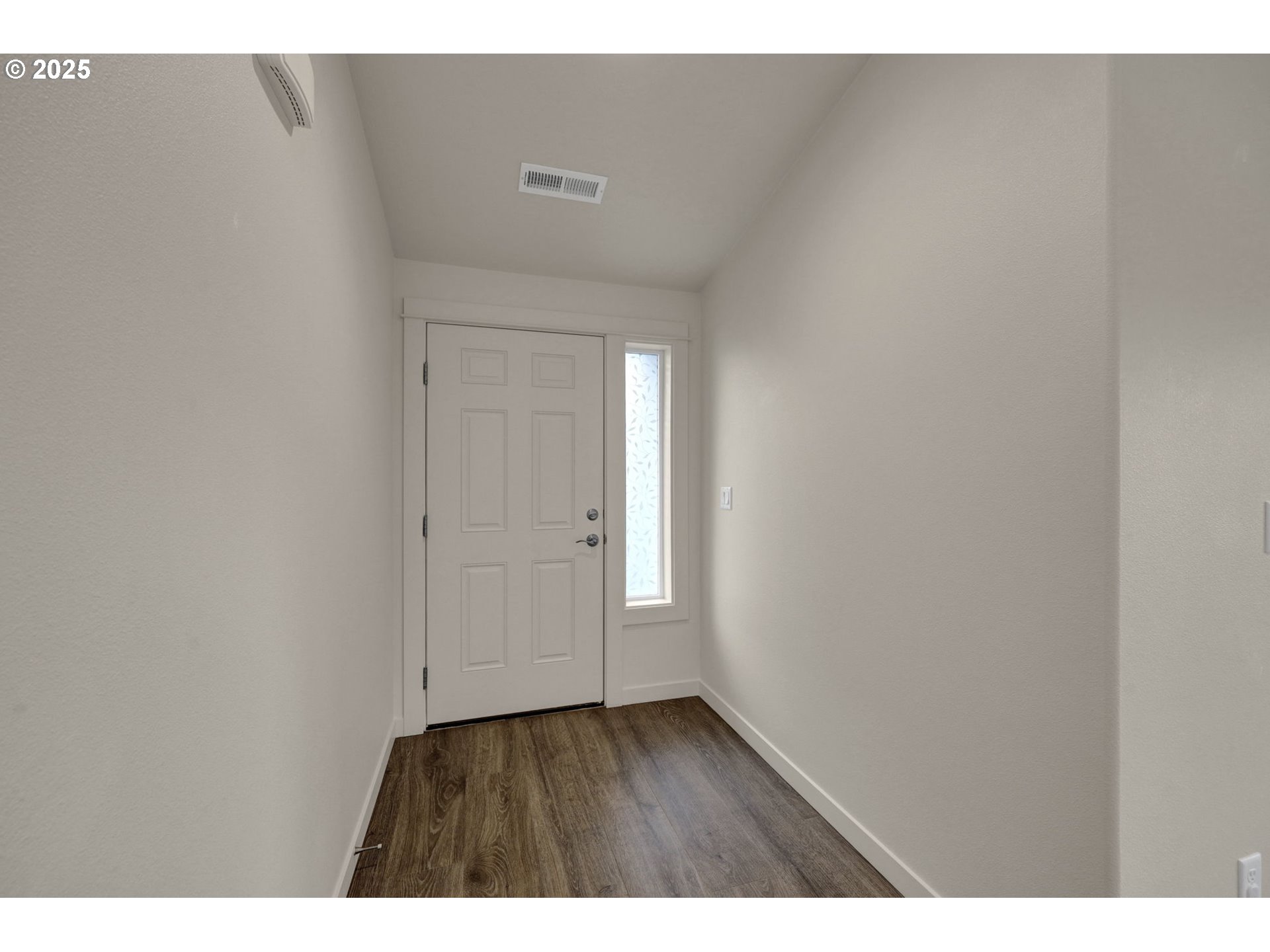 1632 Dotie Drive Springfield, OR 97477 - Photo 4 of 29 a view of an empty room and wooden floor