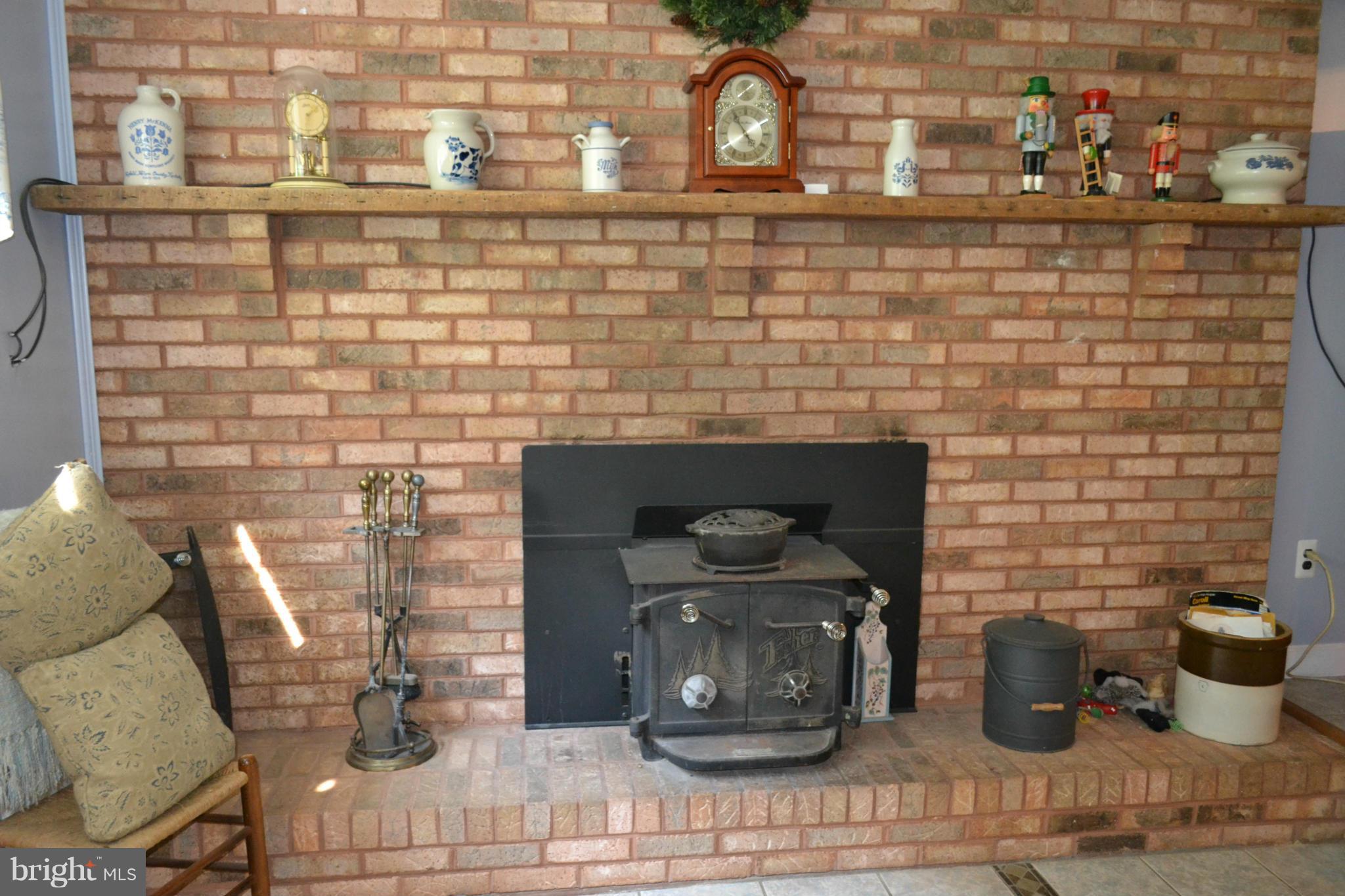 1505 Brehm Road Westminster, MD 21157 - Photo 5 of 30 Family Room in Lower Level w/ Large Brick Hearth