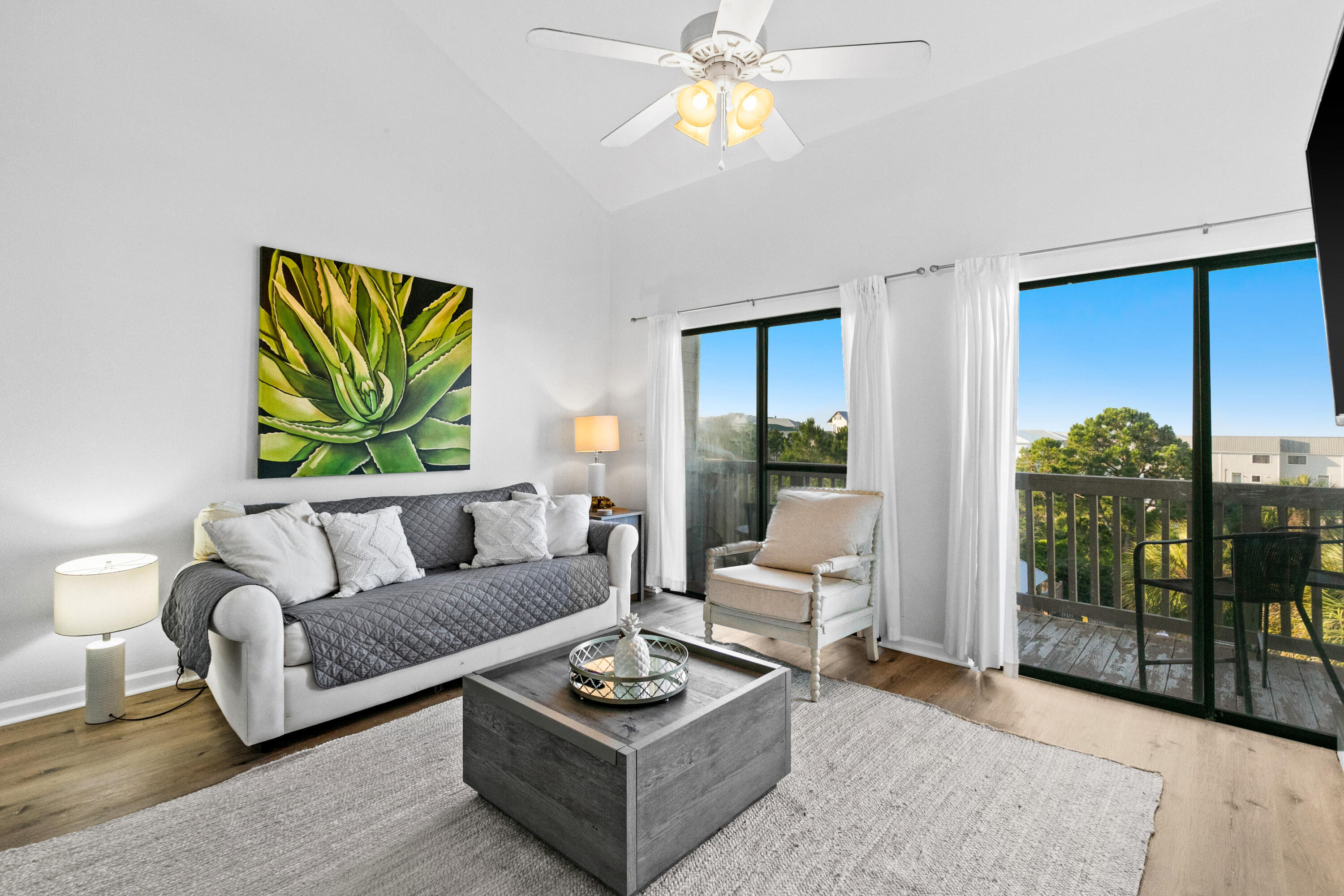 145 Beachfront Trail, Unit 302A Santa Rosa Beach, FL 32459 - Photo 1 of 21 a living room with furniture and a large window
