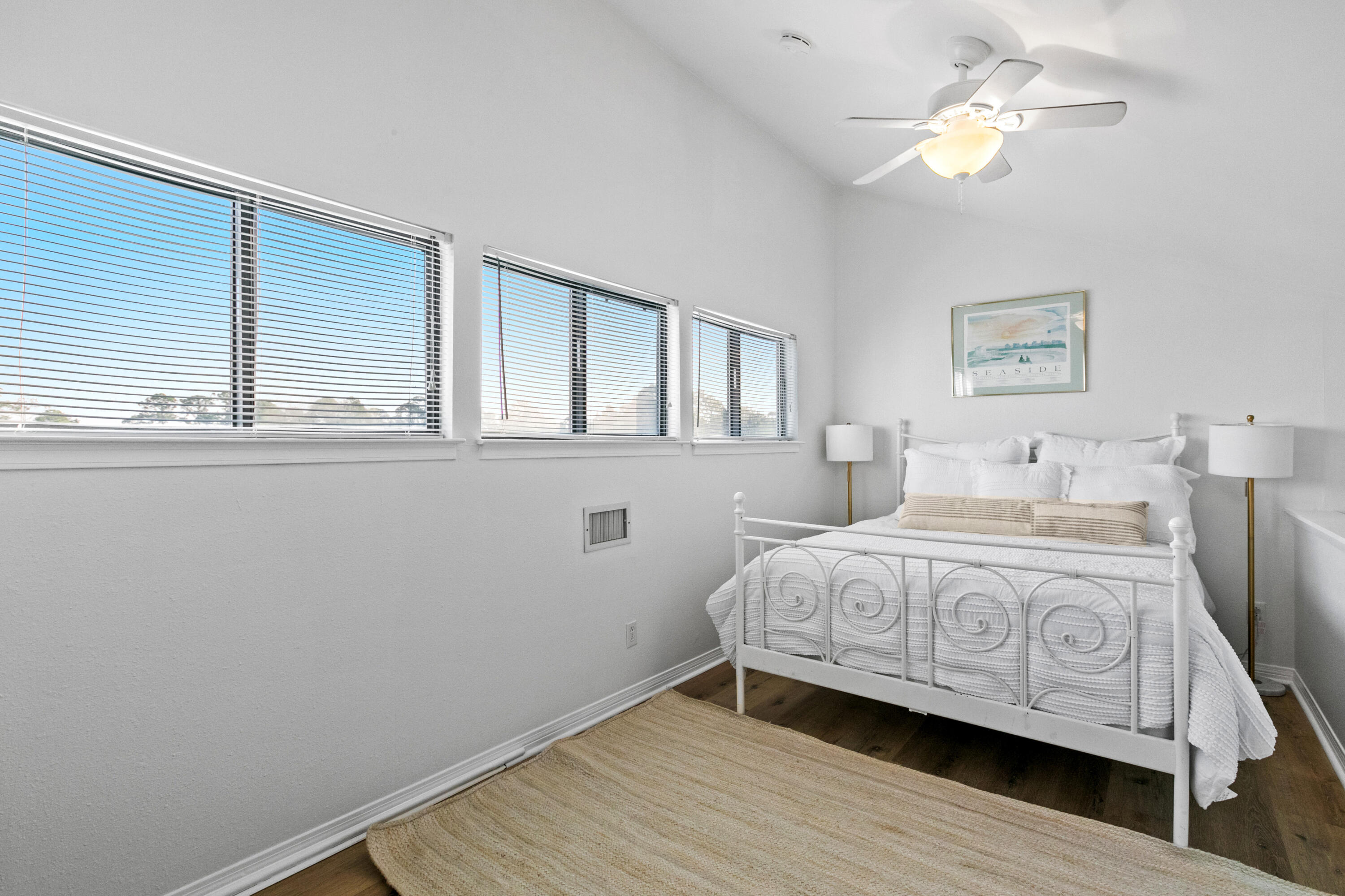 145 Beachfront Trail, Unit 302A Santa Rosa Beach, FL 32459 - Photo 14 of 21 a bedroom with a bed chandelier and a window