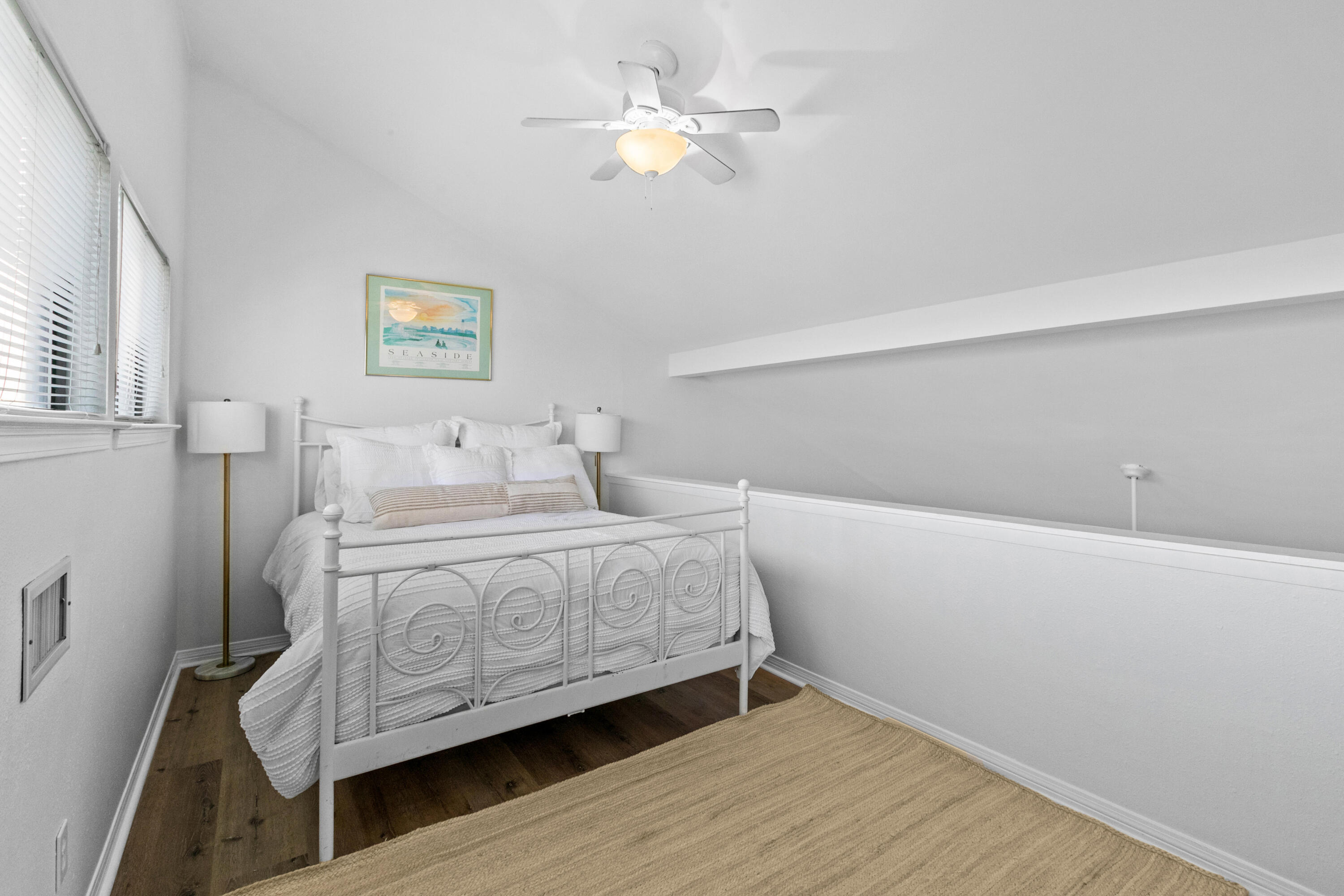 145 Beachfront Trail, Unit 302A Santa Rosa Beach, FL 32459 - Photo 16 of 21 a bedroom with a bed and a chandelier