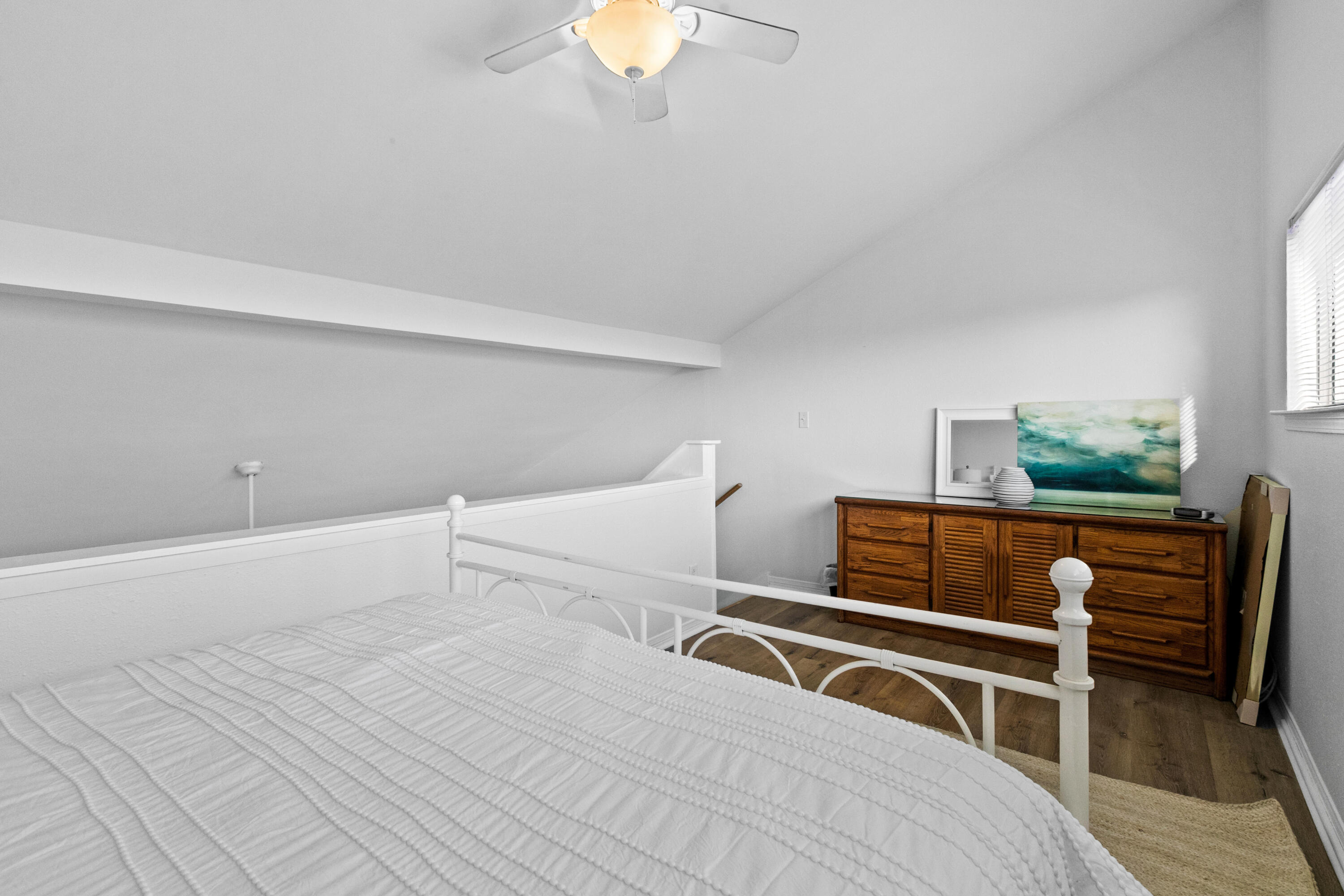 145 Beachfront Trail, Unit 302A Santa Rosa Beach, FL 32459 - Photo 17 of 21 a bedroom with a bed and a chandelier