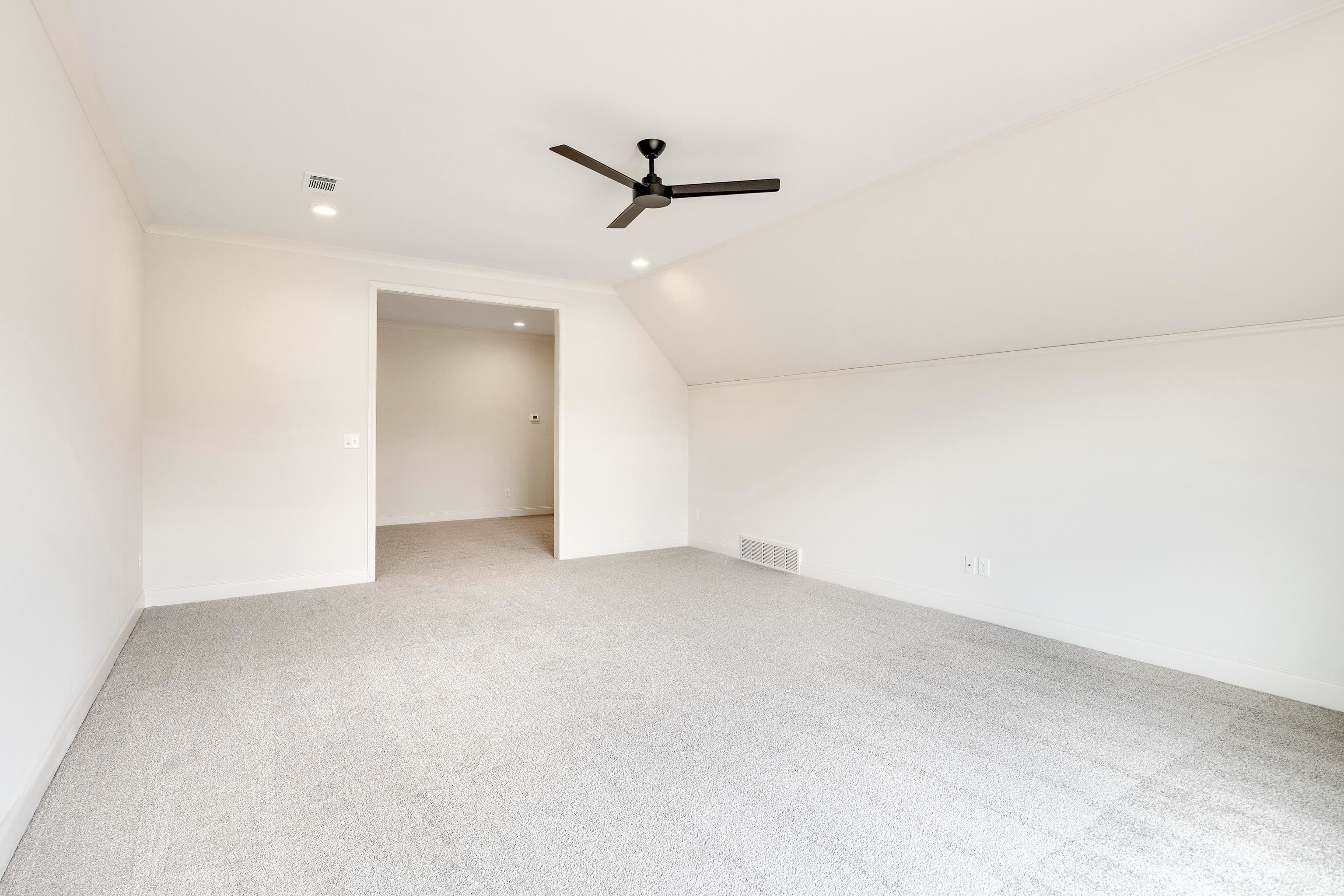 65 Magnolia Rdg Drive Rossville, TN 38066 - Photo 33 of 40 an empty room with a ceiling fan and a window