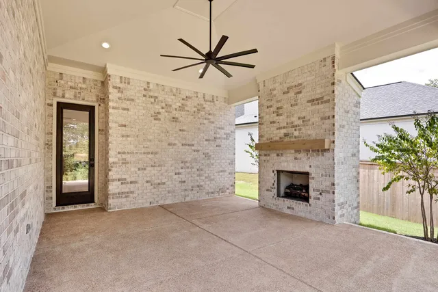 a front view of a house with yard and porch