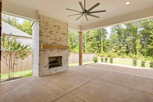 a view of a swimming pool with a patio