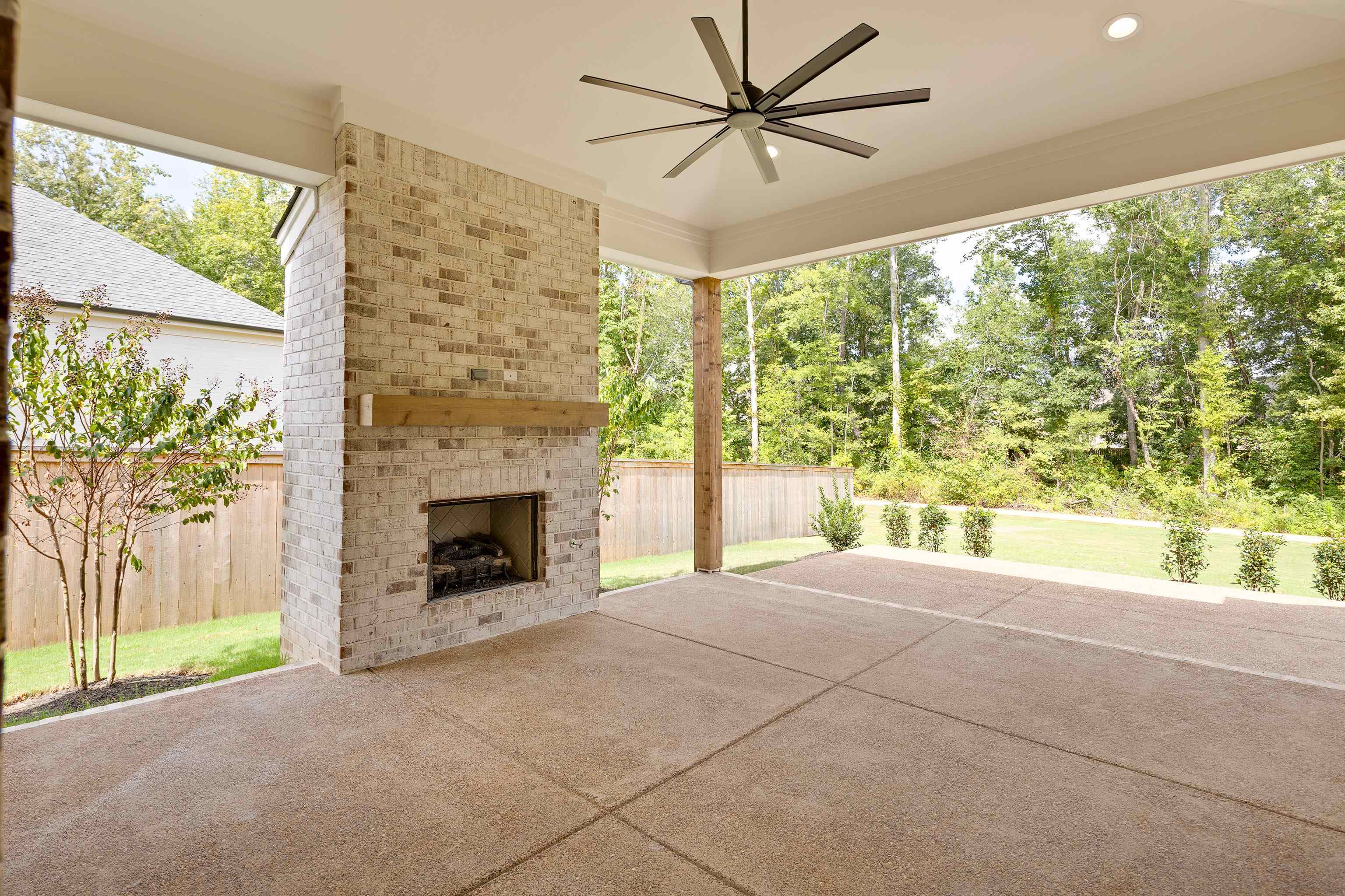 65 Magnolia Rdg Drive Rossville, TN 38066 - Photo 35 of 40 a view of an empty room with a fireplace and a window