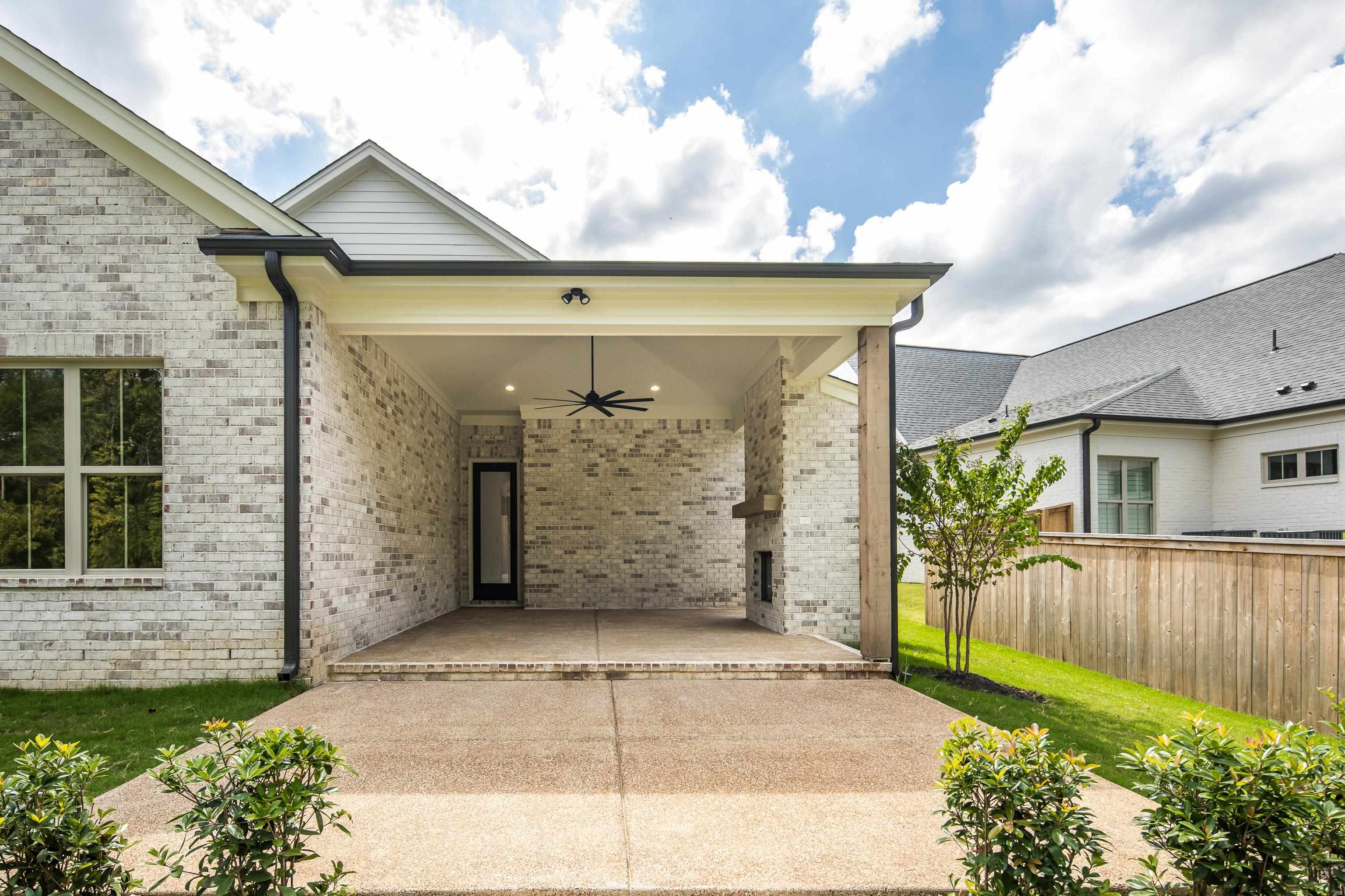 65 Magnolia Rdg Drive Rossville, TN 38066 - Photo 37 of 40 a view of a house with a garden and pathway
