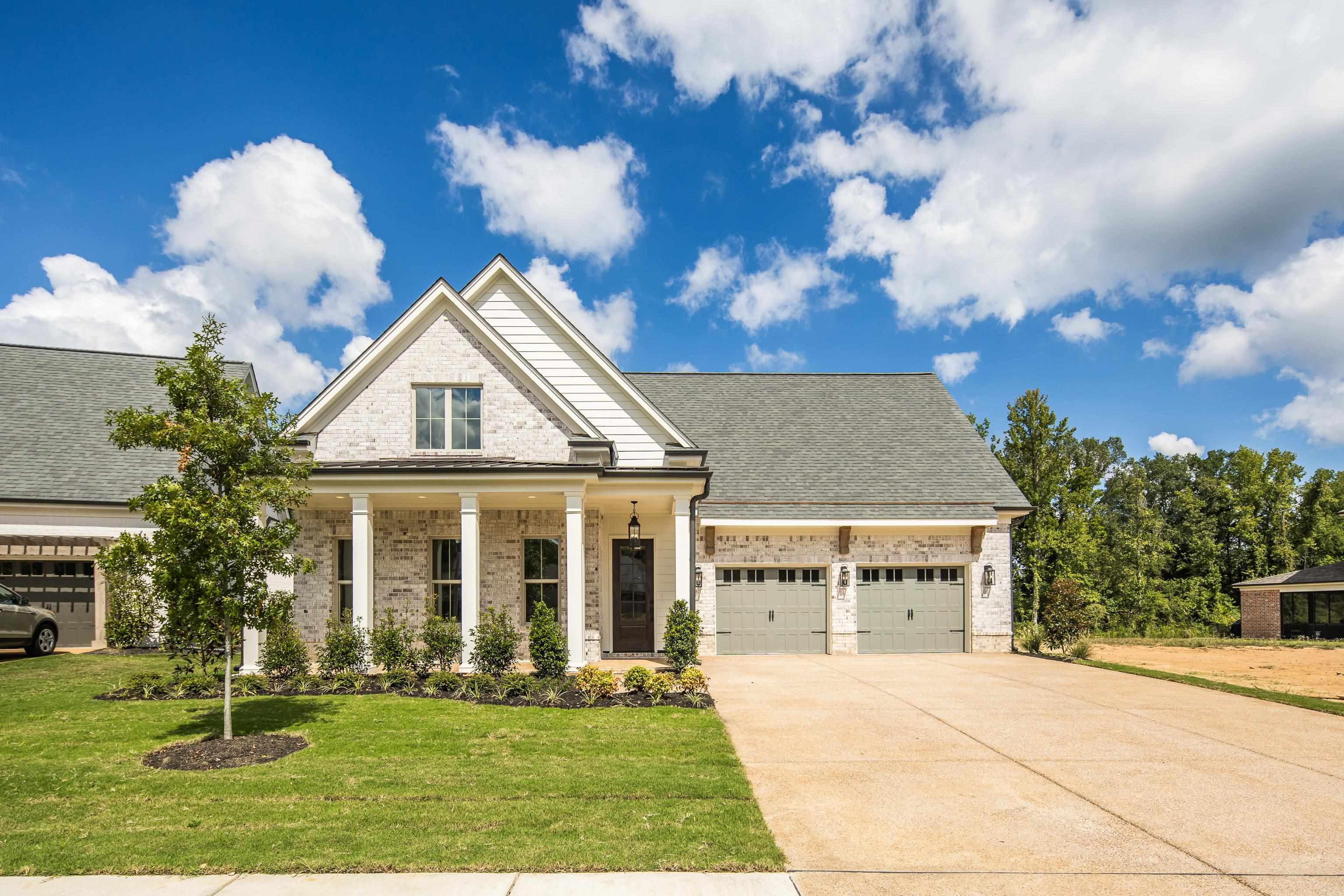 65 Magnolia Rdg Drive Rossville, TN 38066 - Photo 4 of 40 a front view of a house with a yard