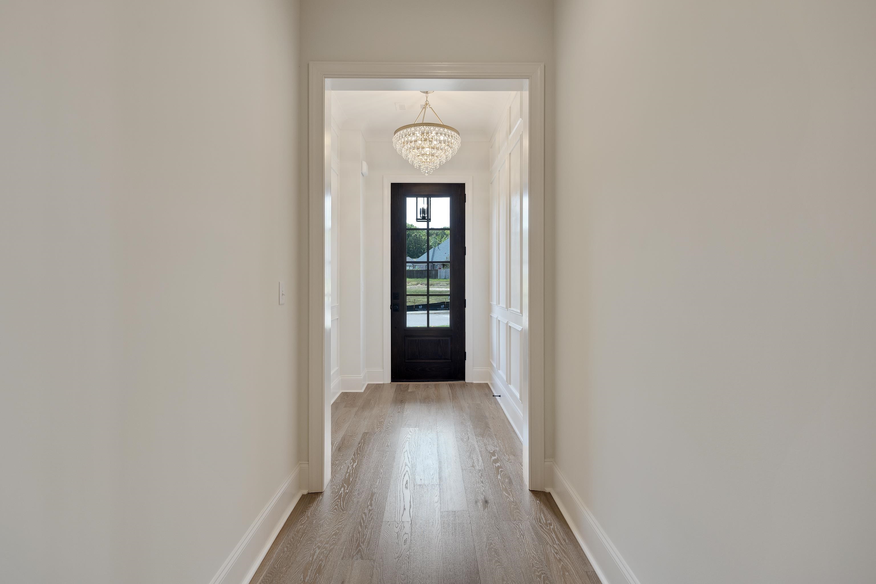 65 Magnolia Rdg Drive Rossville, TN 38066 - Photo 6 of 40 a view of a hallway with wooden floor