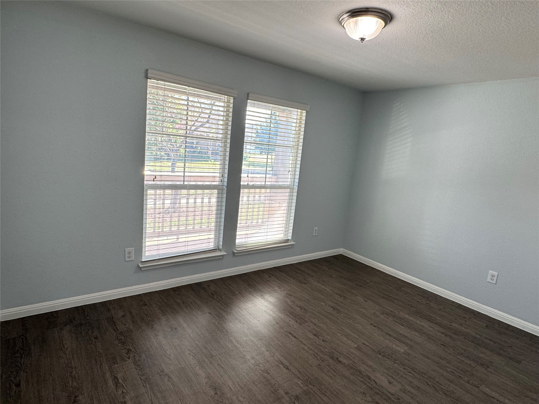 1520 Portchester Castle Path Pflugerville, TX 78660 - Photo 11 of 26 Newly installed wood-look flooring creates a warm and inviting atmosphere in this flexible space.