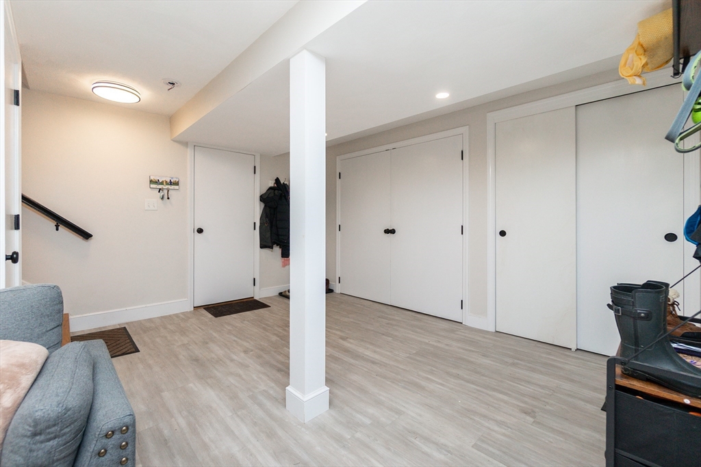 8 Sawyer Avenue Canton, MA 02021 - Photo 12 of 13 a view of livingroom with hardwood floor and hallway