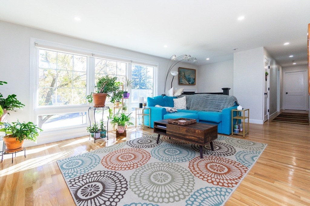 8 Sawyer Avenue Canton, MA 02021 - Photo 5 of 13 a living room with furniture and a large window