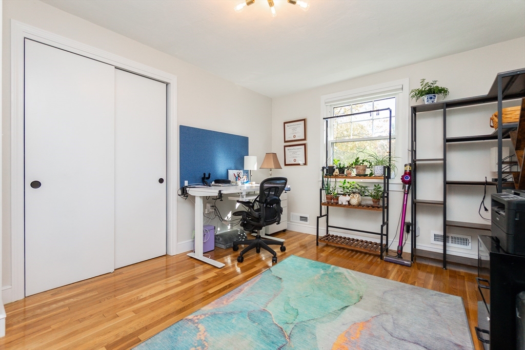 8 Sawyer Avenue Canton, MA 02021 - Photo 8 of 13 a room with gym equipment and a window