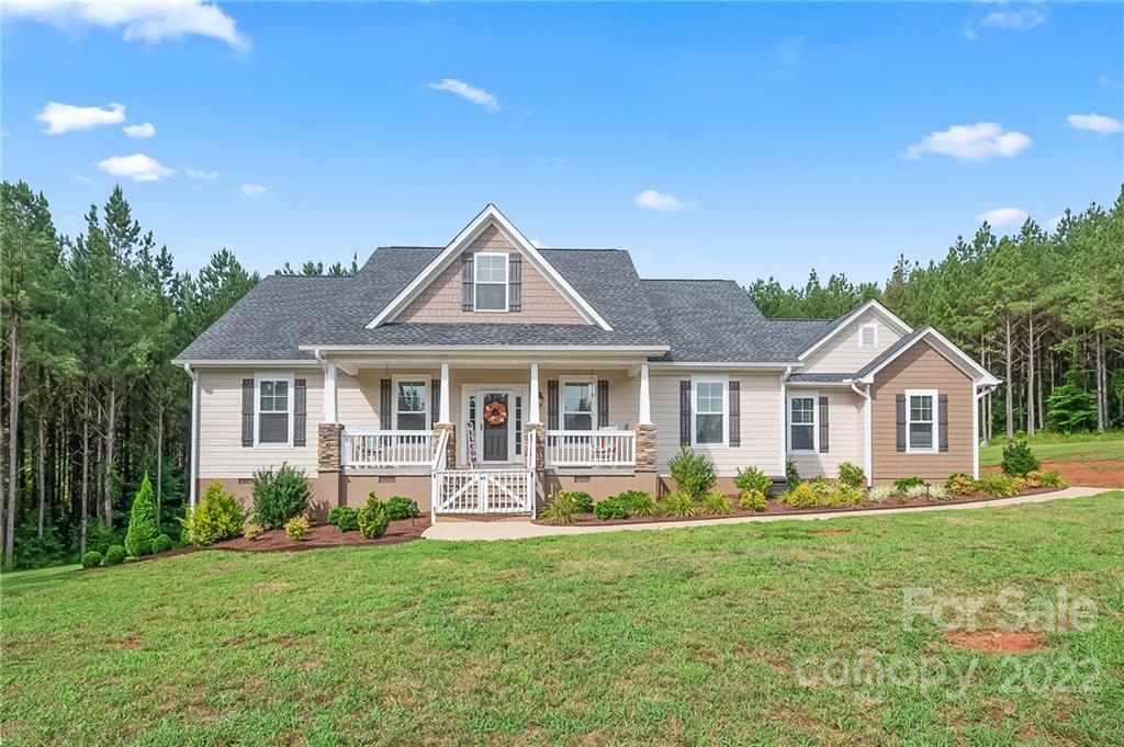 624 Spur Alley, Unit 19 Rutherfordton, NC 28139 - Photo 1 of 41 a front view of a house with a yard