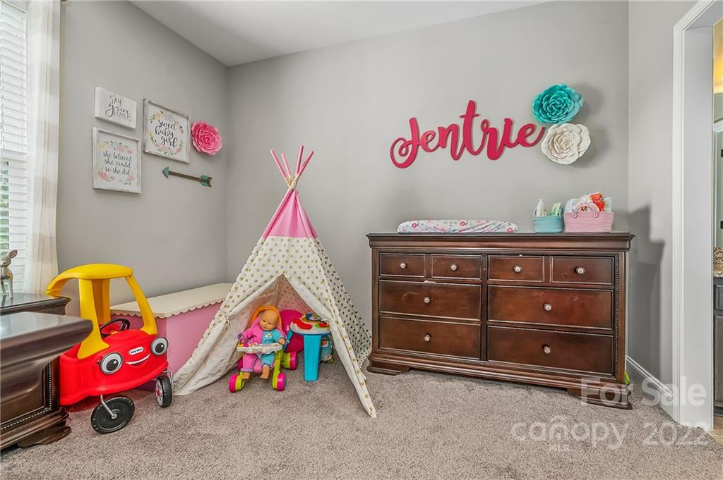 624 Spur Alley, Unit 19 Rutherfordton, NC 28139 - Photo 24 of 41 a view of play room with toys
