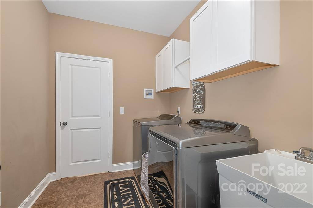 624 Spur Alley, Unit 19 Rutherfordton, NC 28139 - Photo 28 of 41 a utility room with dryer and washer