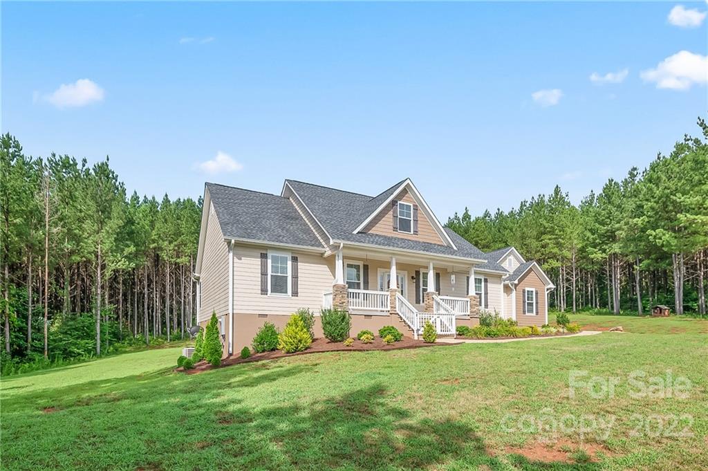 624 Spur Alley, Unit 19 Rutherfordton, NC 28139 - Photo 30 of 41 a front view of a house with a yard