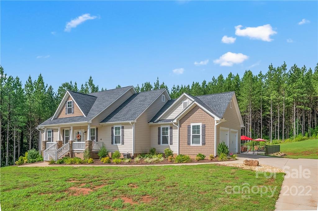 624 Spur Alley, Unit 19 Rutherfordton, NC 28139 - Photo 31 of 41 a front view of a house with a yard