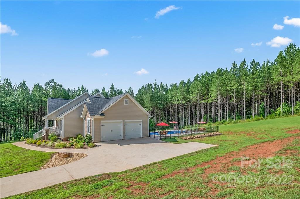 624 Spur Alley, Unit 19 Rutherfordton, NC 28139 - Photo 35 of 41 a front view of house with yard and green space