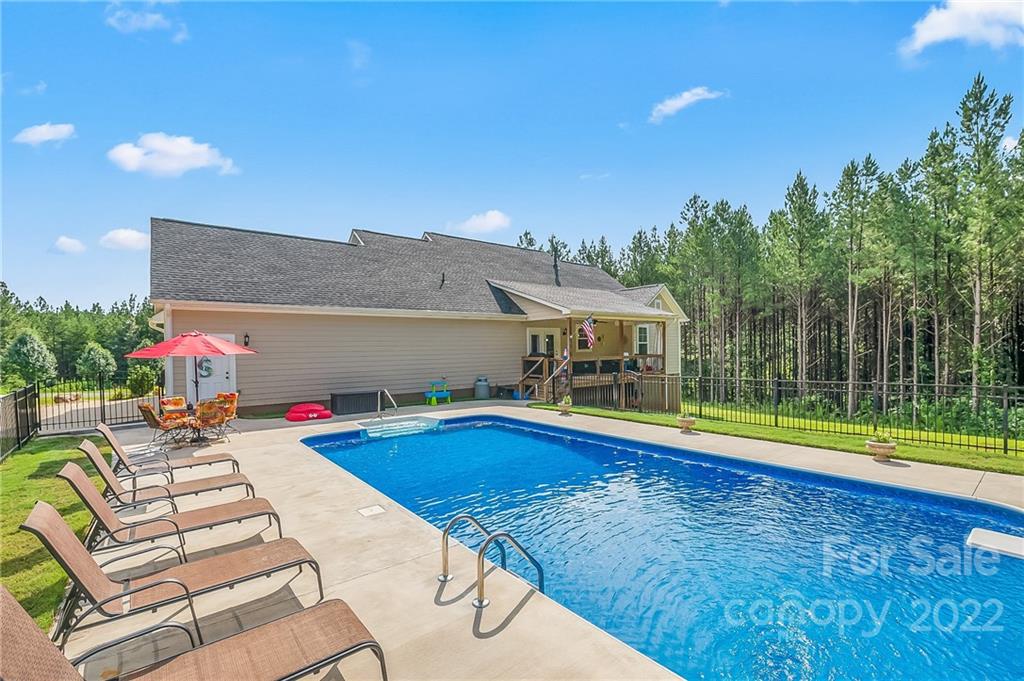 624 Spur Alley, Unit 19 Rutherfordton, NC 28139 - Photo 37 of 41 a view of swimming pool with lounge chair
