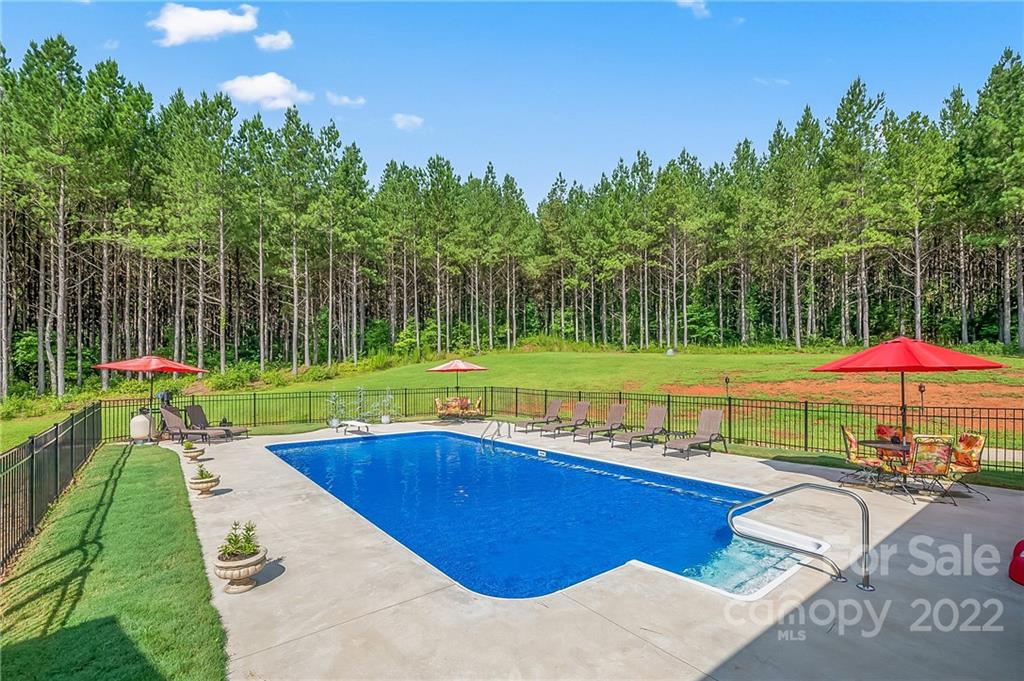 624 Spur Alley, Unit 19 Rutherfordton, NC 28139 - Photo 39 of 41 a view of a swimming pool with a patio