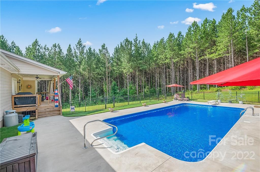 624 Spur Alley, Unit 19 Rutherfordton, NC 28139 - Photo 4 of 41 an outdoor space with pool and furniture
