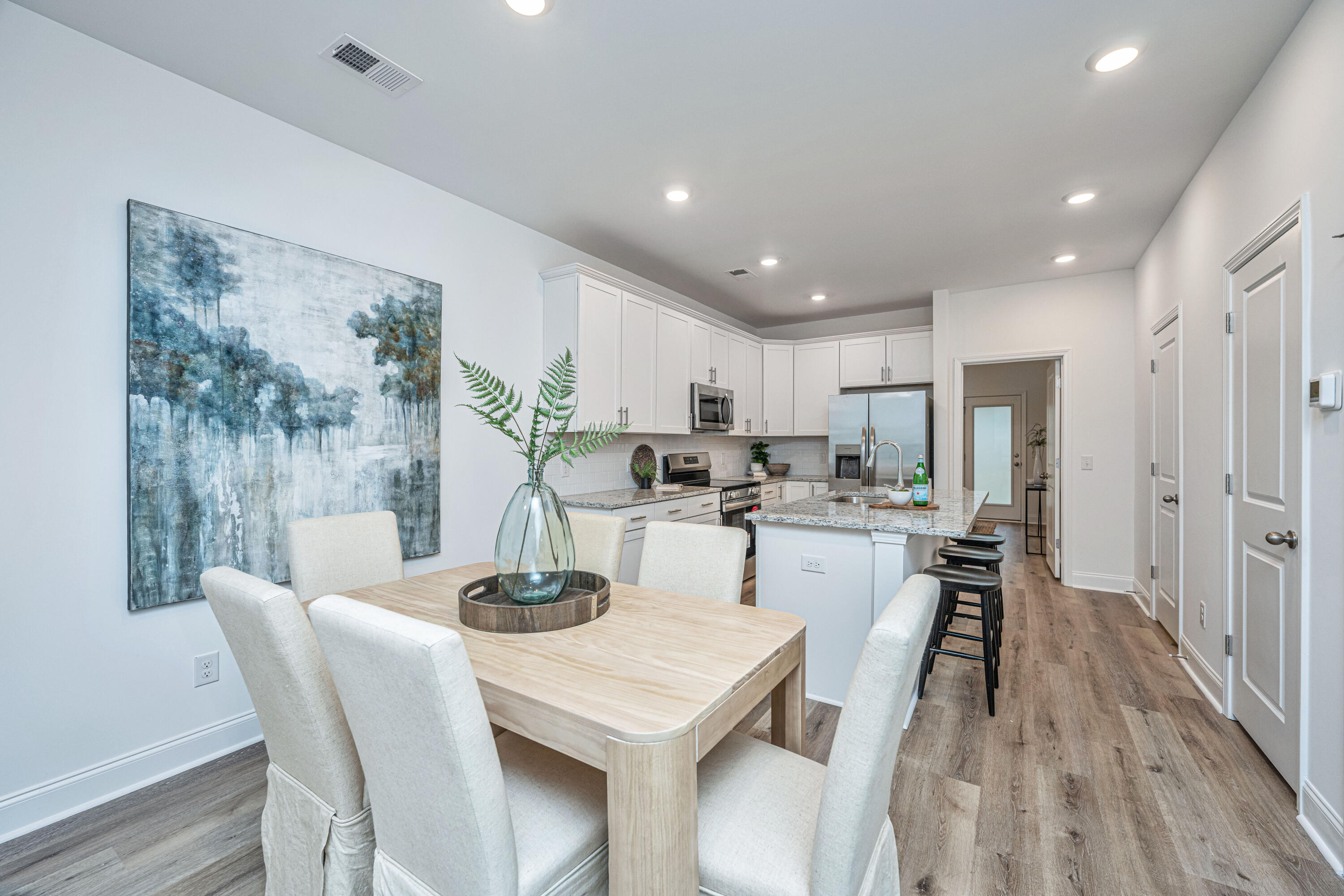 302 Twin Rivers Drive Wando, SC 29492 - Photo 8 of 24 TRT 302 dining and kitchen