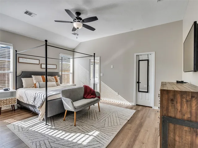 a bathroom with a double vanity sink and mirror