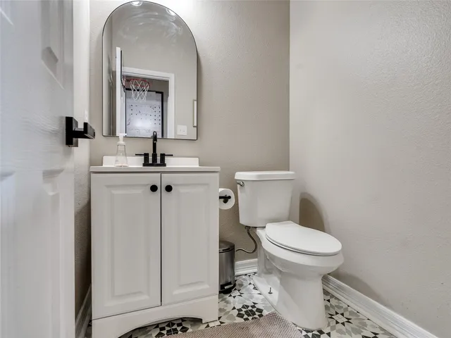 a house view with a garden space