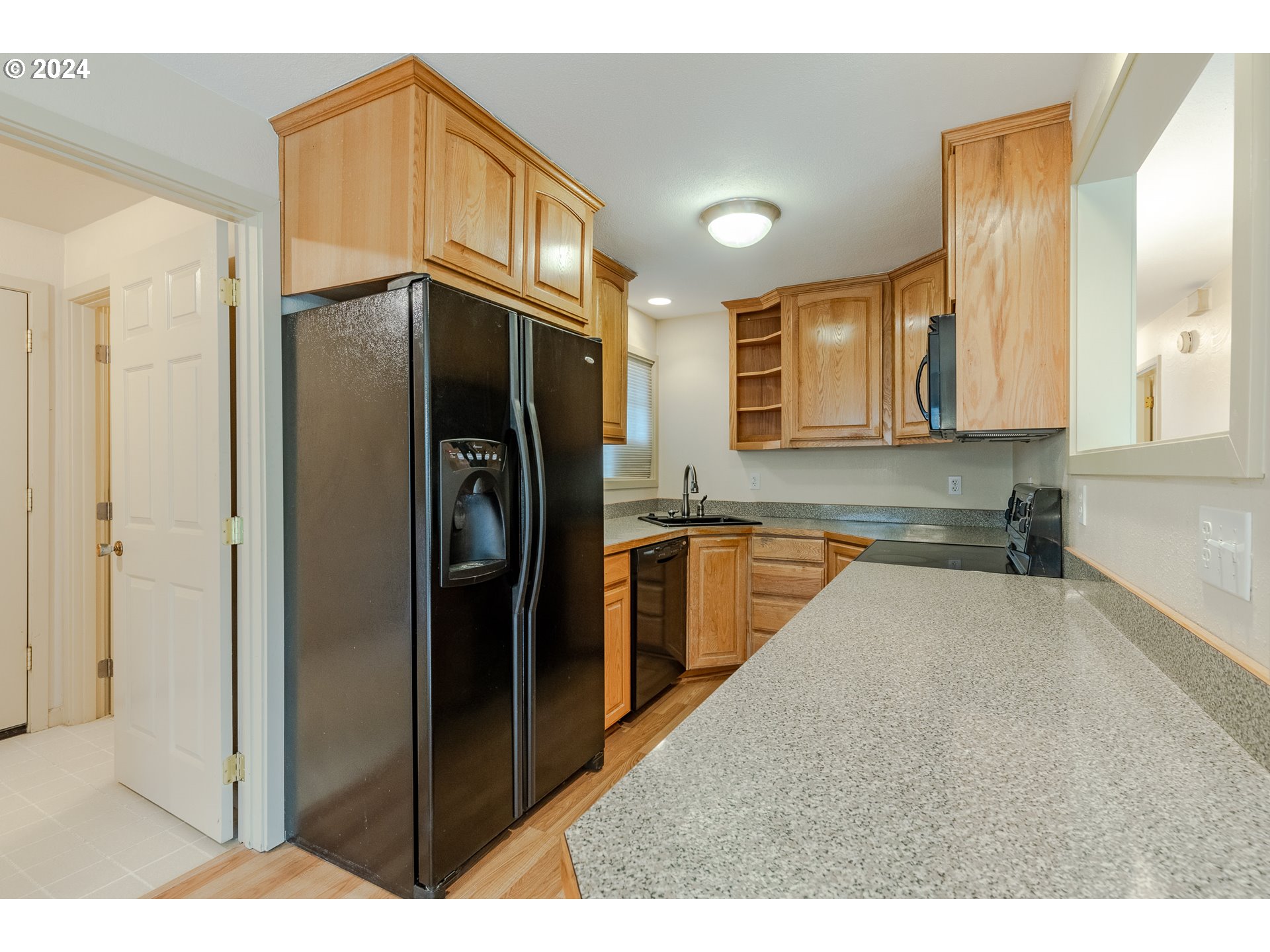 2175 Debra Drive Springfield, OR 97477 - Photo 9 of 22 a kitchen with stainless steel appliances granite countertop a refrigerator and a sink