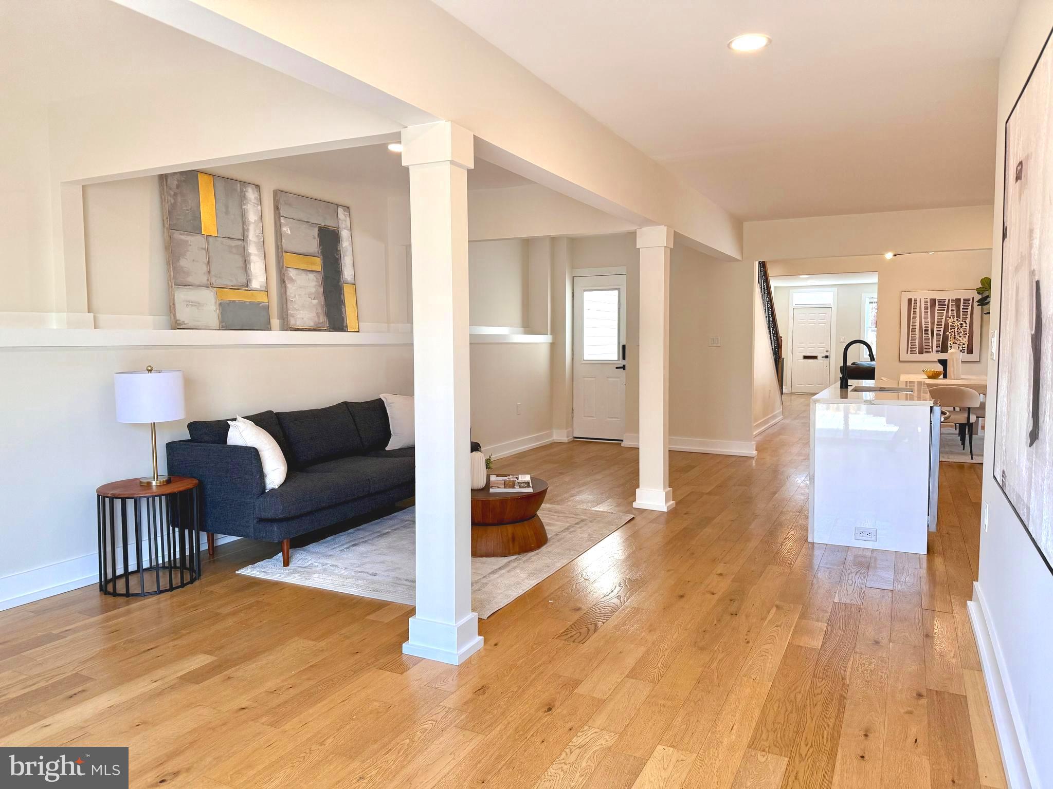 310 South Alfred Street Alexandria, VA 22314 - Photo 22 of 63 a living room with furniture and a wooden floor
