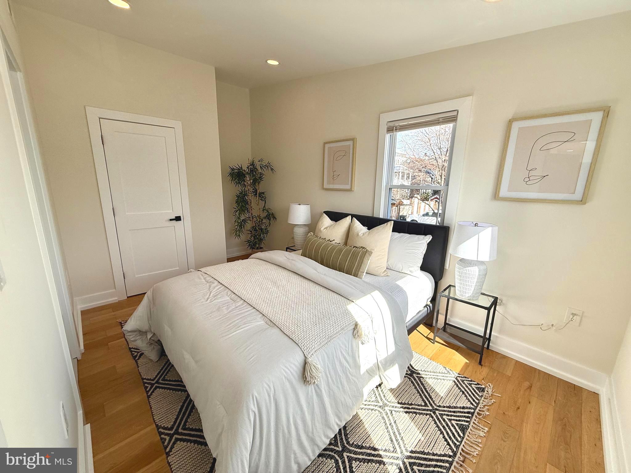310 South Alfred Street Alexandria, VA 22314 - Photo 37 of 63 a bedroom with a bed and a window
